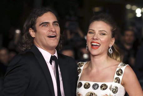 Cast members Joaquin Phoenix (L) and Scarlett Johansson (R) arrive for a red carpet event for the movie "Her" at the Rome Film Festival, in Cast members Joaquin Phoenix (L) and Scarlett Johansson (R) arrive for a red carpet event for the movie "Her" at the Rome Film Festival, in