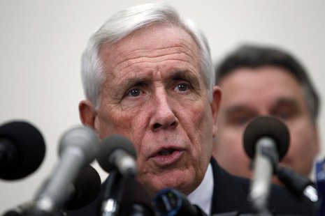 U.S. Representative Frank Wolf (R-VA) speaks with Rep. Chris Smith (R-NJ) (obscured) during a news conference on Capitol Hill in Washington, U.S. Representative Frank Wolf (R-VA) speaks with Rep. Chris Smith (R-NJ) (obscured) during a news conference on Capitol Hill in Washington,