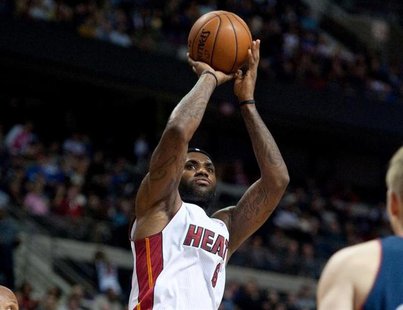 Dec 8, 2013; Auburn Hills, MI, USA; Miami Heat small forward LeBron James (6) shoots during the second quarter against the Detroit Pistons a Dec 8, 2013; Auburn Hills, MI, USA; Miami Heat small forward LeBron James (6) shoots during the second quarter against the Detroit Pistons a