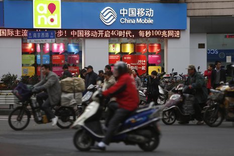 A China Mobile office is seen in downtown Shanghai December 18, 2013. REUTERS/Aly Song A China Mobile office is seen in downtown Shanghai December 18, 2013. REUTERS/Aly Song