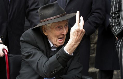 File photograph shows Great Train Robber Ronnie Biggs gesturing as he arrives for the funeral of Bruce Reynolds, at the church of St Barthol File photograph shows Great Train Robber Ronnie Biggs gesturing as he arrives for the funeral of Bruce Reynolds, at the church of St Barthol