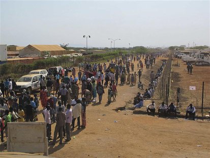 Civilians arrive to a shelter at the United Nations Mission in the Republic of South Sudan (UNMISS) compound on the outskirts of the capital Civilians arrive to a shelter at the United Nations Mission in the Republic of South Sudan (UNMISS) compound on the outskirts of the capital