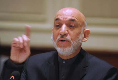 Afghanistan's President Hamid Karzai gestures as he addresses media representatives during a press interaction in New Delhi December 14, 201 Afghanistan's President Hamid Karzai gestures as he addresses media representatives during a press interaction in New Delhi December 14, 201