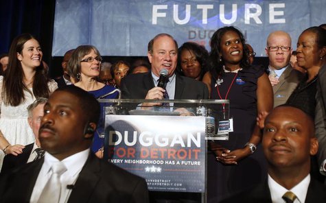 Detroit mayoral candidate Mike Duggan (C) addresses his supporters after being declared the projected winner on election day in Detroit, Mic Detroit mayoral candidate Mike Duggan (C) addresses his supporters after being declared the projected winner on election day in Detroit, Mic