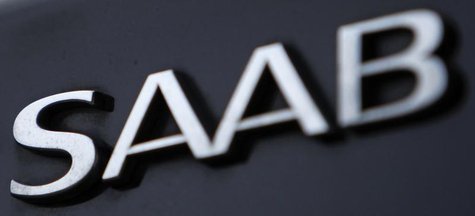 The logo of Swedish manufacturer Saab is seen on a car in Prague June 13, 2012. REUTERS/David W Cerny The logo of Swedish manufacturer Saab is seen on a car in Prague June 13, 2012. REUTERS/David W Cerny