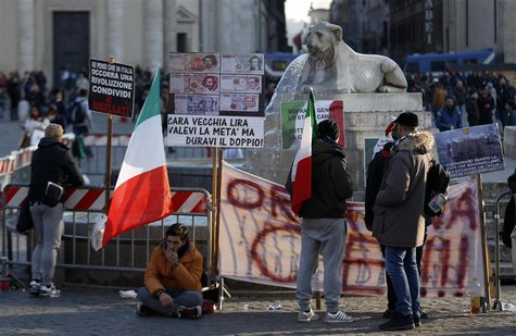 People take part in a demonstration organised by "People from pitchfork movement" to protest against economic insecurity and the government People take part in a demonstration organised by "People from pitchfork movement" to protest against economic insecurity and the government
