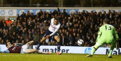 Nacer Chadli (C) of Tottenham Hotspur has his shot saved by Adrian of West Ham United during their English League Cup quarter-final soccer m Nacer Chadli (C) of Tottenham Hotspur has his shot saved by Adrian of West Ham United during their English League Cup quarter-final soccer m