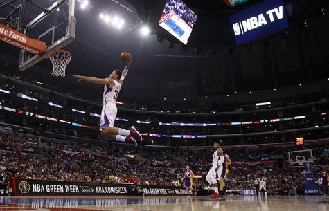 Los Angeles Clippers forward Blake Griffin (L) leaps for a dunk against the Los Angeles Lakers during the first half of their NBA basketball Los Angeles Clippers forward Blake Griffin (L) leaps for a dunk against the Los Angeles Lakers during the first half of their NBA basketball