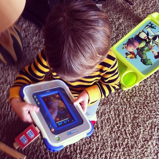 A child plays with an InnoTab tablet device. A child plays with an InnoTab tablet device.