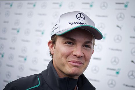Mercedes Formula One driver Nico Rosberg of Germany smiles as he speaks to journalists after arriving at the Circuit of The Americas in Aust Mercedes Formula One driver Nico Rosberg of Germany smiles as he speaks to journalists after arriving at the Circuit of The Americas in Aust