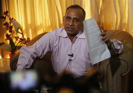 Uttam Khobragade, father of Devyani Khobragade, India's deputy consul general in New York, speaks during a news conference in Mumbai Decembe Uttam Khobragade, father of Devyani Khobragade, India's deputy consul general in New York, speaks during a news conference in Mumbai Decembe