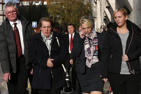 Family members of British soldier Lee Rigby leave during a lunch break in the trial of his suspected murderers at the Old Bailey in central Family members of British soldier Lee Rigby leave during a lunch break in the trial of his suspected murderers at the Old Bailey in central
