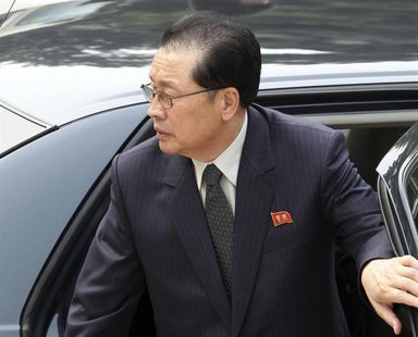 Jang song-thaek, Chief of the Central Administrative Department of the Workers' Party of Korea, exits a car as he arrives at the Ziguangge b Jang song-thaek, Chief of the Central Administrative Department of the Workers' Party of Korea, exits a car as he arrives at the Ziguangge b