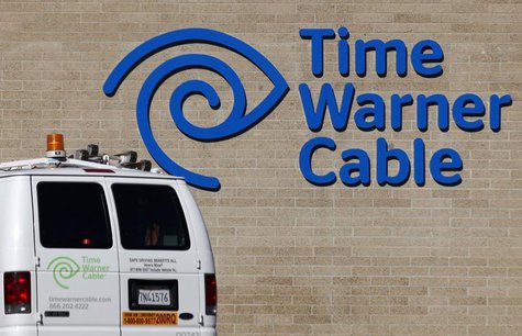 A cable truck returns to a Time Warner Cable office in San Diego, California December 11, 2013. REUTERS/Mike Blake A cable truck returns to a Time Warner Cable office in San Diego, California December 11, 2013. REUTERS/Mike Blake