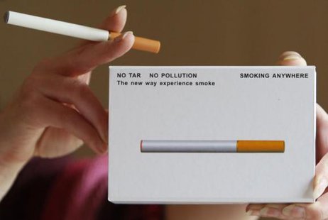 A woman displays a package of E-cigarette, an electronic substitute in the form of a rod, slightly longer than a normal cigarette, in Bordeaux, southwestern France, on March 25, 2008.
CREDIT: REUTERS/REGIS DUVIGNAU A woman displays a package of E-cigarette, an electronic substitute in the form of a rod, slightly longer than a normal cigarette, in Bordeaux, southwestern France, on March 25, 2008.
CREDIT: REUTERS/REGIS DUVIGNAU