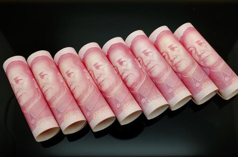100 Yuan notes are seen in this illustration picture in Beijing November 5, 2013. REUTERS/Jason Lee 100 Yuan notes are seen in this illustration picture in Beijing November 5, 2013. REUTERS/Jason Lee