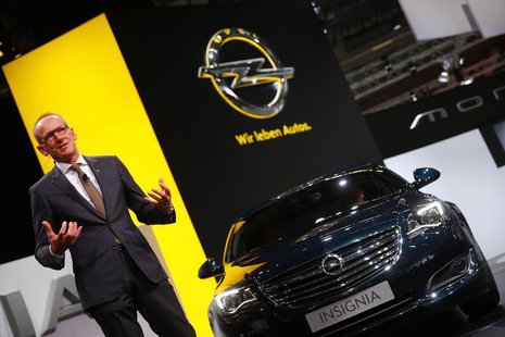 Karl-Thomas Neumann, CEO of Adam Opel AG, presents the new Opel Insignia car during a media preview day at the Frankfurt Motor Show (IAA) Se Karl-Thomas Neumann, CEO of Adam Opel AG, presents the new Opel Insignia car during a media preview day at the Frankfurt Motor Show (IAA) Se