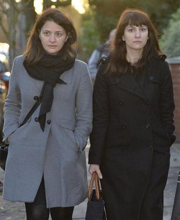 Sisters Francesca (R) and Elisabetta Grillo arrive at Isleworth Crown Court in west London December 19, 2013. REUTERS/Toby Melville Sisters Francesca (R) and Elisabetta Grillo arrive at Isleworth Crown Court in west London December 19, 2013. REUTERS/Toby Melville