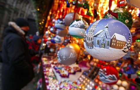 Christ Child Market guests look at traditional Christmas tree ball ornaments at the opening day of Germany's oldest Christkindlesmarkt in Nu Christ Child Market guests look at traditional Christmas tree ball ornaments at the opening day of Germany's oldest Christkindlesmarkt in Nu