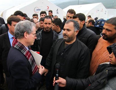 U.S. Ambassador to Syria Robert Ford (L) talks with Syrian refugees as he visits Islahiye refugee camp in Gaziantep province January 24, 201 U.S. Ambassador to Syria Robert Ford (L) talks with Syrian refugees as he visits Islahiye refugee camp in Gaziantep province January 24, 201
