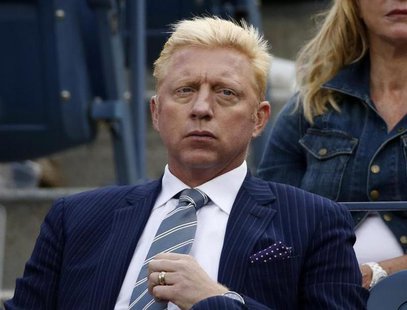 Tennis great Boris Becker of Germany watches the match between Richard Gasquet of France and Rafael Nadal of Spain during the men's semi-fin Tennis great Boris Becker of Germany watches the match between Richard Gasquet of France and Rafael Nadal of Spain during the men's semi-fin