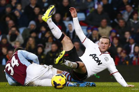 Aston Villa's Matthew Lowton (L) challenges Manchester United's Wayne Rooney during their English Premier League soccer match at Villa Park Aston Villa's Matthew Lowton (L) challenges Manchester United's Wayne Rooney during their English Premier League soccer match at Villa Park