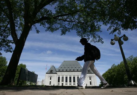 A woman walks past the Supreme Court of Canada in Ottawa May 7, 2010. REUTERS/Chris Wattie A woman walks past the Supreme Court of Canada in Ottawa May 7, 2010. REUTERS/Chris Wattie