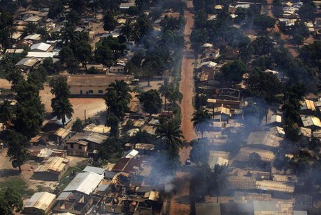Smoke rises after homes were damaged in arson attacks in this aerial view of a neighbourhood in Central African Republic's capital Bangui De Smoke rises after homes were damaged in arson attacks in this aerial view of a neighbourhood in Central African Republic's capital Bangui De