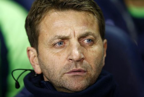 Tottenham Hotspur caretaker manager Tim Sherwood watches their English League Cup soccer match against West Ham United at White Hart Lane, L Tottenham Hotspur caretaker manager Tim Sherwood watches their English League Cup soccer match against West Ham United at White Hart Lane, L