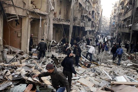 Residents look for survivors through damage by what activists said was an airstrike with explosive barrels from forces loyal to President Ba Residents look for survivors through damage by what activists said was an airstrike with explosive barrels from forces loyal to President Ba