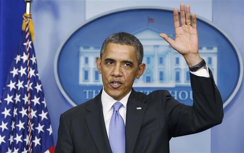 U.S. President Barack waves goodbye at the end of his year-end news conference in the White House briefing room in Washington, December 20, U.S. President Barack waves goodbye at the end of his year-end news conference in the White House briefing room in Washington, December 20,