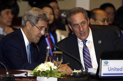 U.S. Secretary of State John Kerry (L) and U.S. Trade Representative Michael Froman talk prior to the Asia Pacific Economic Cooperation mini U.S. Secretary of State John Kerry (L) and U.S. Trade Representative Michael Froman talk prior to the Asia Pacific Economic Cooperation mini