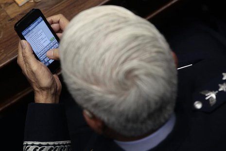 Brazilian Air Force Commander, Lieutenant-Brigadier Juniti Saito, writes a text message to an unidentified person named Araujo to celebrate Brazilian Air Force Commander, Lieutenant-Brigadier Juniti Saito, writes a text message to an unidentified person named Araujo to celebrate