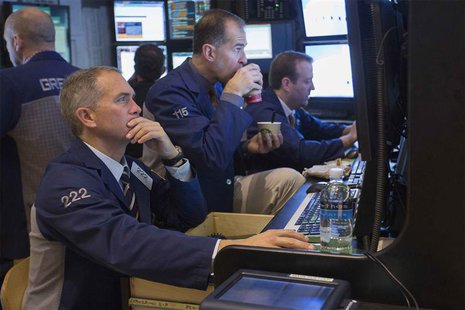 Traders work on the floor of the New York Stock Exchange shortly after the market opening December 19, 2013. REUTERS/Lucas Jackson Traders work on the floor of the New York Stock Exchange shortly after the market opening December 19, 2013. REUTERS/Lucas Jackson