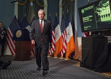 New York Mayor Michael Bloomberg walks from the podium after delivering the 2014 city budget in the Blue Room of New York's City Hall, in th New York Mayor Michael Bloomberg walks from the podium after delivering the 2014 city budget in the Blue Room of New York's City Hall, in th