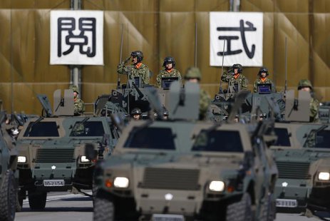 Members of Japan's Self-Defence Forces' infantry unit take part in the military's review during the annual troop review ceremony at Asaka Ba Members of Japan's Self-Defence Forces' infantry unit take part in the military's review during the annual troop review ceremony at Asaka Ba
