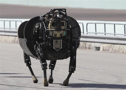 An LS 3 (Legged Squad Support System) robot demonstrates its movement, showing it is designed to accompany soldiers and Marines any place th An LS 3 (Legged Squad Support System) robot demonstrates its movement, showing it is designed to accompany soldiers and Marines any place th