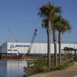 Construction cranes and palm trees line the entrance at South Carolina Boeing in North Charleston, South Carolina December 19, 2013. REUTERS Construction cranes and palm trees line the entrance at South Carolina Boeing in North Charleston, South Carolina December 19, 2013. REUTERS