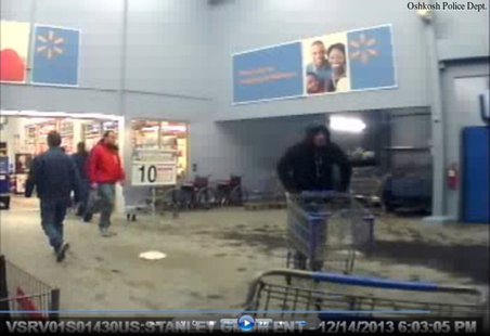 Still frame taken from surveillance video of a person believed to have stolen a Salvation Army red kettle from Walmart in Oshkosh, Dec. 14, 2013. (Photo from the Oshkosh Police Department) Still frame taken from surveillance video of a person believed to have stolen a Salvation Army red kettle from Walmart in Oshkosh, Dec. 14, 2013. (Photo from the Oshkosh Police Department)
