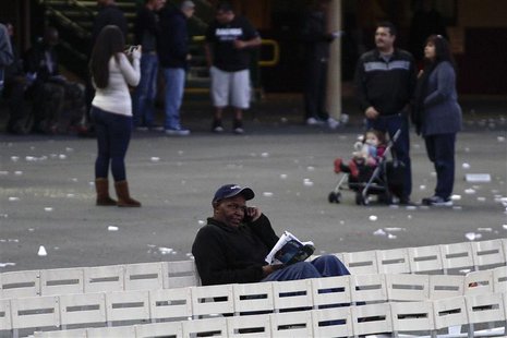 A man handicaps the 10th race at Betfair Hollywood Park, which is closing down at the conclusion of tomorrow's race card after operating for A man handicaps the 10th race at Betfair Hollywood Park, which is closing down at the conclusion of tomorrow's race card after operating for