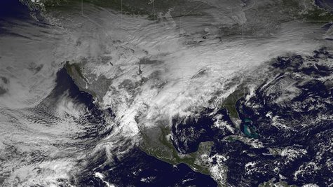 A storm system moving across the United States is pictured in this NASA handout satellite photo taken December 20, 2013. REUTERS/NASA/Handou A storm system moving across the United States is pictured in this NASA handout satellite photo taken December 20, 2013. REUTERS/NASA/Handou
