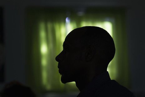 Angesom Solomon, a 28-year-old African migrant from Eritrea, is silhouetted as he attends a first-grade Hebrew lesson at Kehila Democratic s Angesom Solomon, a 28-year-old African migrant from Eritrea, is silhouetted as he attends a first-grade Hebrew lesson at Kehila Democratic s