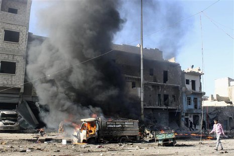 Smoke rises from a vehicle after what activists said was heavy shelling by forces loyal to Syrian President Bashar Al-Assad, in Masaken Hana Smoke rises from a vehicle after what activists said was heavy shelling by forces loyal to Syrian President Bashar Al-Assad, in Masaken Hana