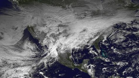 A storm system moving across the United States is pictured in this NASA handout satellite photo taken December 20, 2013.
Credit: Reuters/NASA/Handout
A storm system moving across the United States is pictured in this NASA handout satellite photo taken December 20, 2013.
Credit: Reuters/NASA/Handout