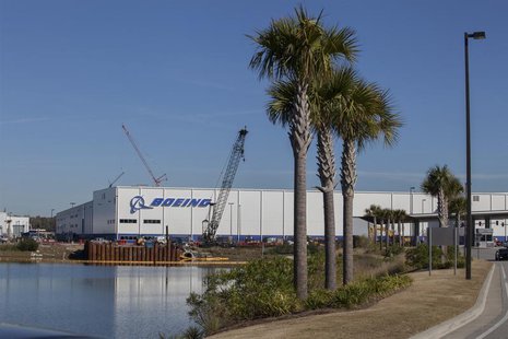 Construction cranes and palm trees line the entrance at South Carolina Boeing in North Charleston, South Carolina December 19, 2013. REUTERS Construction cranes and palm trees line the entrance at South Carolina Boeing in North Charleston, South Carolina December 19, 2013. REUTERS