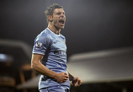 Manchester City's James Milner celebrates his goal against Fulham during their English Premier League soccer match at Craven Cottage in Lond Manchester City's James Milner celebrates his goal against Fulham during their English Premier League soccer match at Craven Cottage in Lond