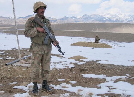 Pakistani soldiers stand guard on a snow-covered mountainous region of Lwara Fort along the Pakistan-Afghanistan border in North Waziristan Pakistani soldiers stand guard on a snow-covered mountainous region of Lwara Fort along the Pakistan-Afghanistan border in North Waziristan