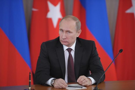 Russia's President Vladimir Putin attends a news conference with Turkey's Prime Minister Tayyip Erdogan (not seen) in Strelna near St. Peter Russia's President Vladimir Putin attends a news conference with Turkey's Prime Minister Tayyip Erdogan (not seen) in Strelna near St. Peter