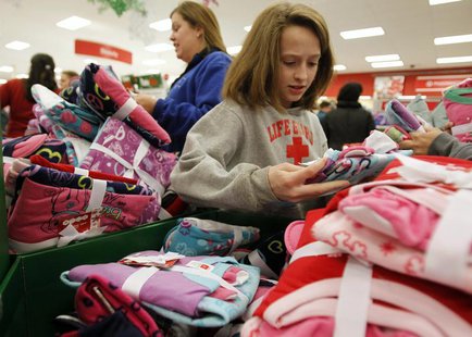 Shoppers look through a bin full of pajamas inside a Target store on the shopping day dubbed "Black Friday" in Torrington, Connecticut Novem Shoppers look through a bin full of pajamas inside a Target store on the shopping day dubbed "Black Friday" in Torrington, Connecticut Novem