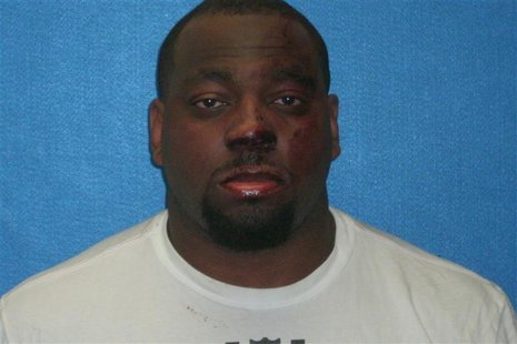 Chicago Bears defensive lineman Henry Melton is pictured in this undated booking photo courtesy of the Grapevine Police Department. Melton h Chicago Bears defensive lineman Henry Melton is pictured in this undated booking photo courtesy of the Grapevine Police Department. Melton h